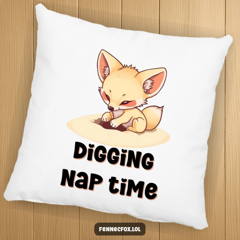 Funny pillow depicting a fennec fox playfully digging an energetic hole in soft sand, cozy comfort.