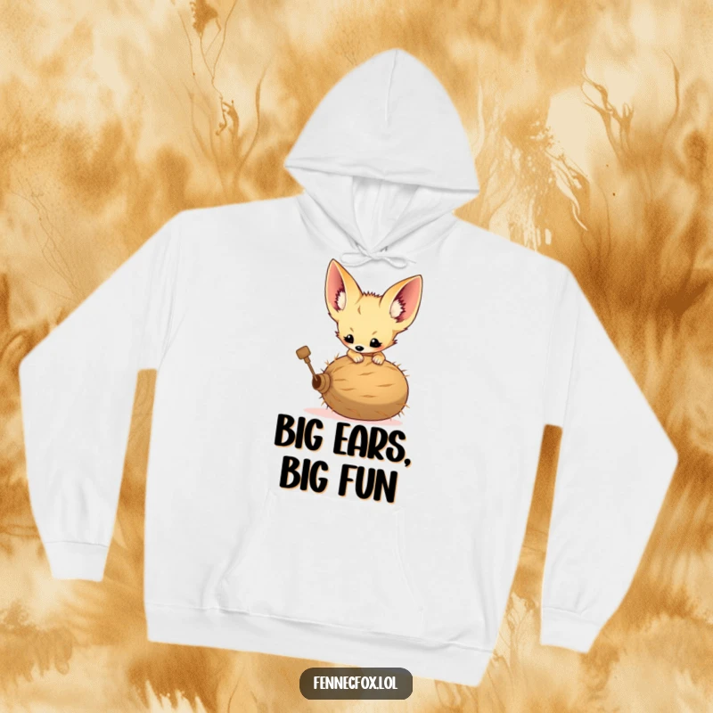 Funny hoodie depicting a fennec fox kit with enormous ears playfully pouncing on a tumbleweed, showcasing desert fun.