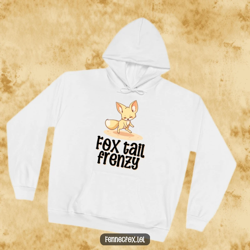 Funny fennec fox hoodie featuring a playful fennec fox chasing its tail in a sandy circle, perfect for cozy, humorous wear.