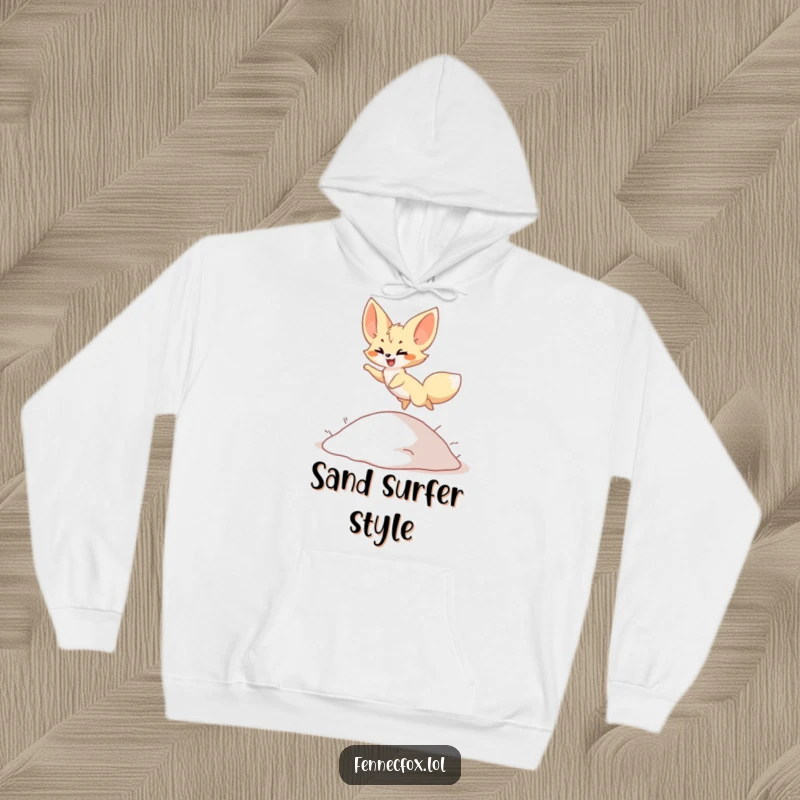 Funny Hoodie: Cute fennec fox character joyfully leaping over a small sand dune, soft and warm, perfect for adventurers, funny gift.
