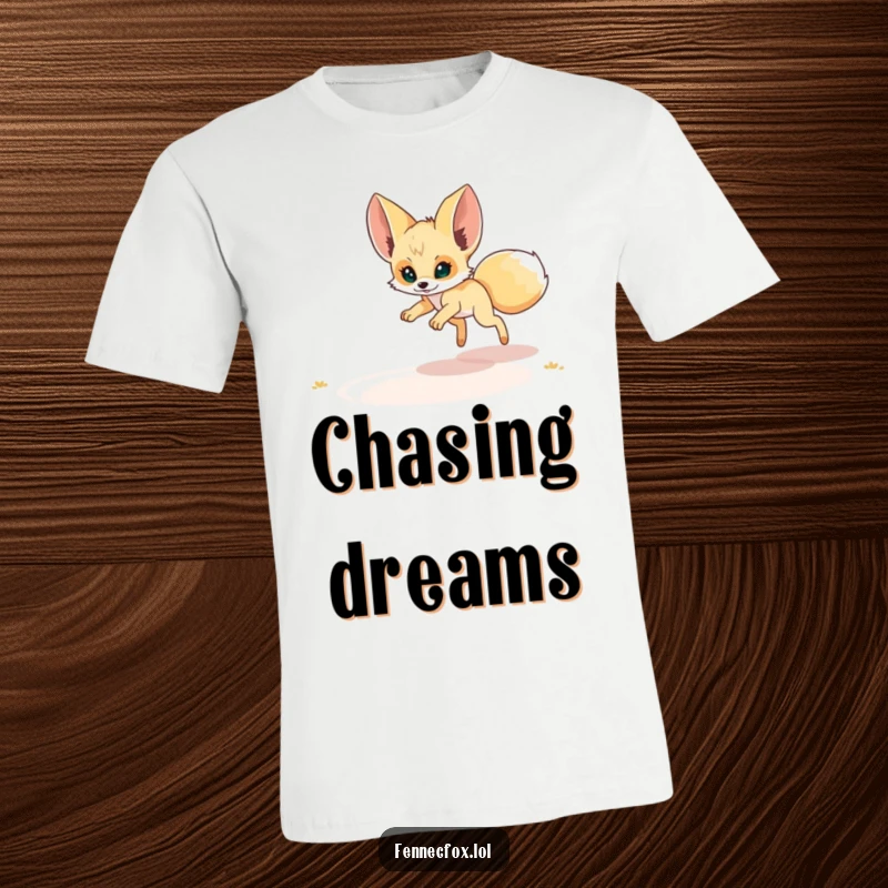 Funny Fennec Fox T-Shirt: A silly fennec fox playfully pounces at a shimmering desert mirage, showcasing its comical and optimistic pursuit.