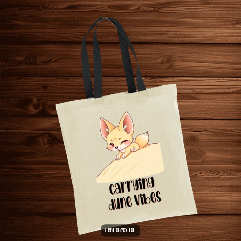 Funny Fennec Fox Tote Bag: A winking fennec fox slides down a sandy dune, adding a dose of playful desert humor to your carry-all.