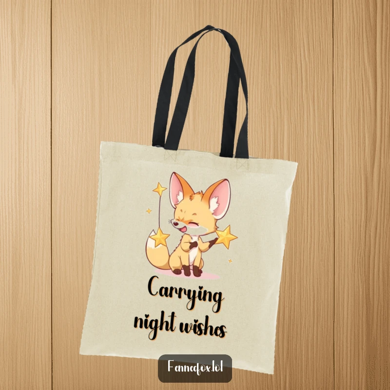 Funny tote bag illustrating a fennec fox gleefully batting at a sparkling desert star, perfect for everyday magic.